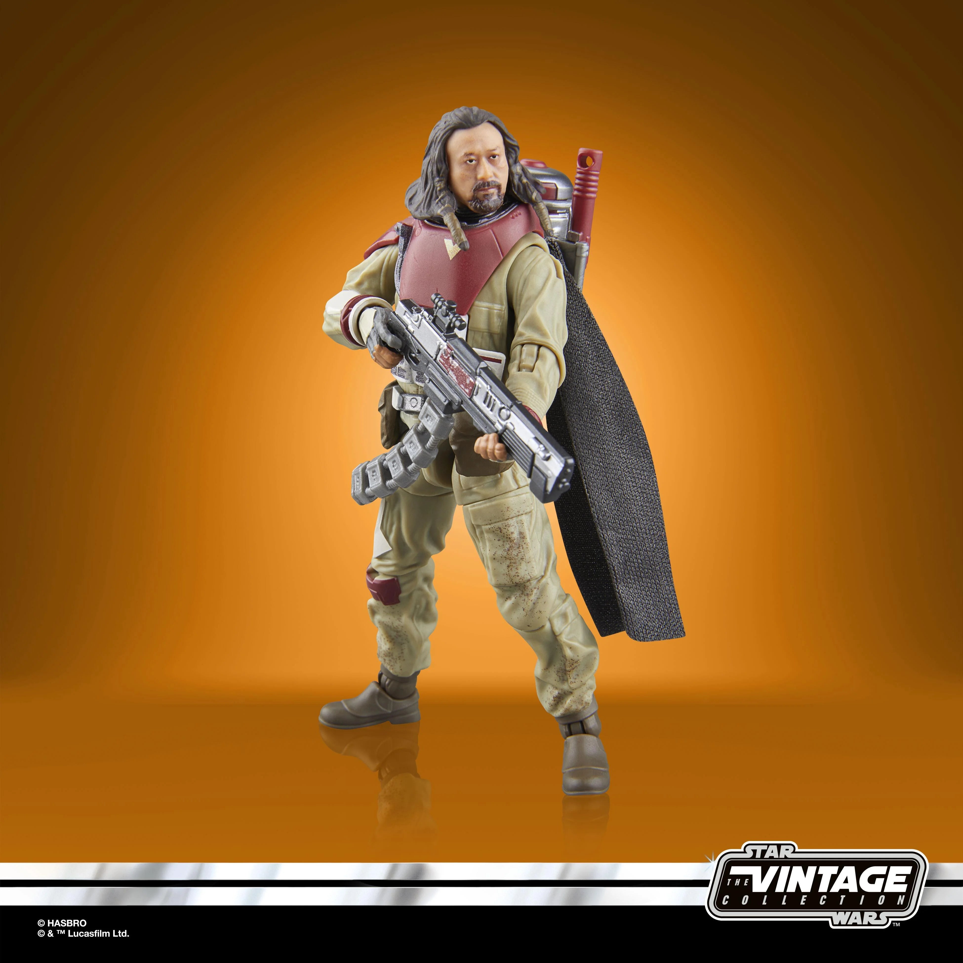 Action figure from 'Star Wars' with a weapon and cape on an orange background, featuring 'The Vintage Collection' logo.